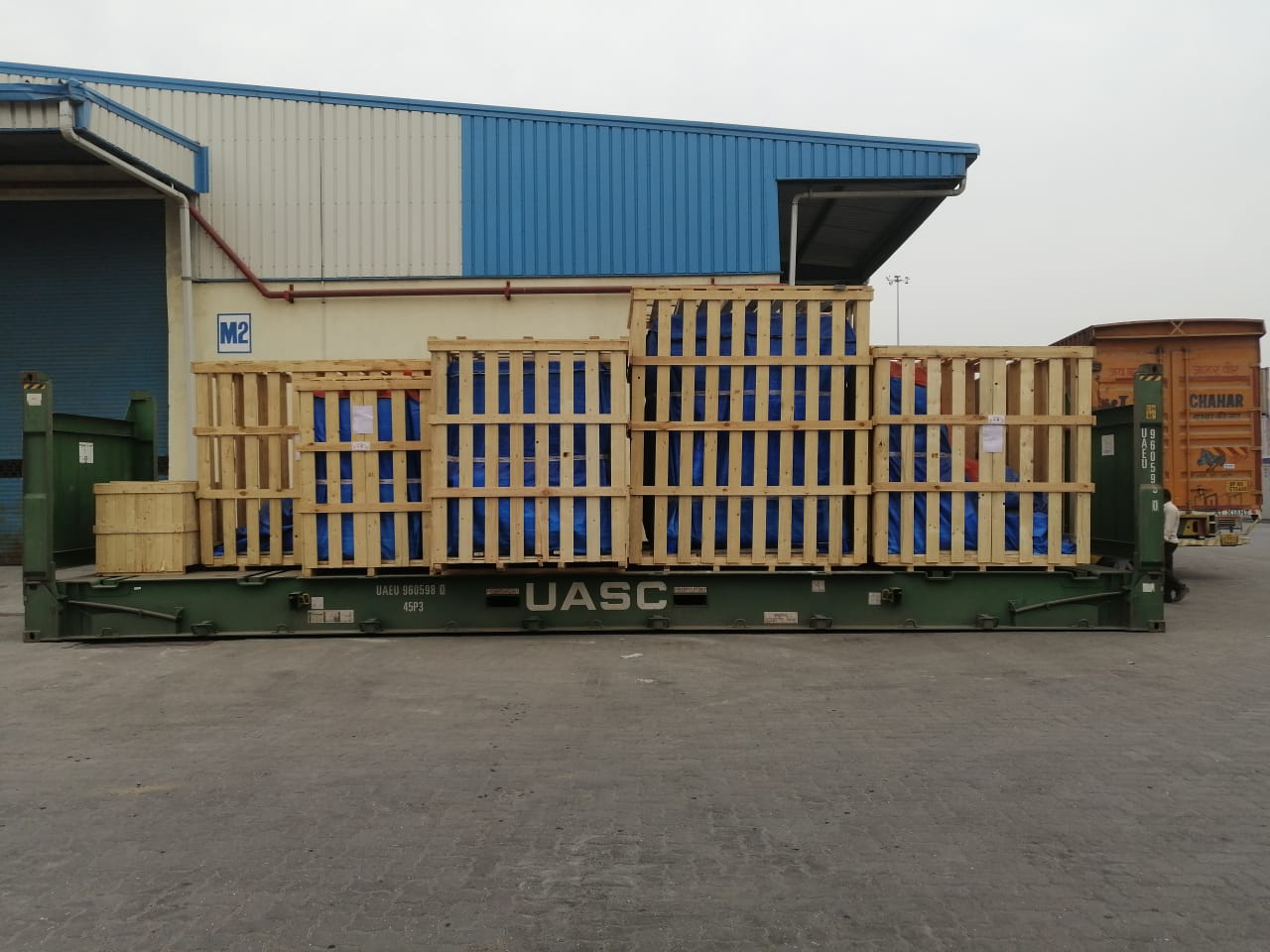 Large Wooden Crated Equipment on Flat Rack Container