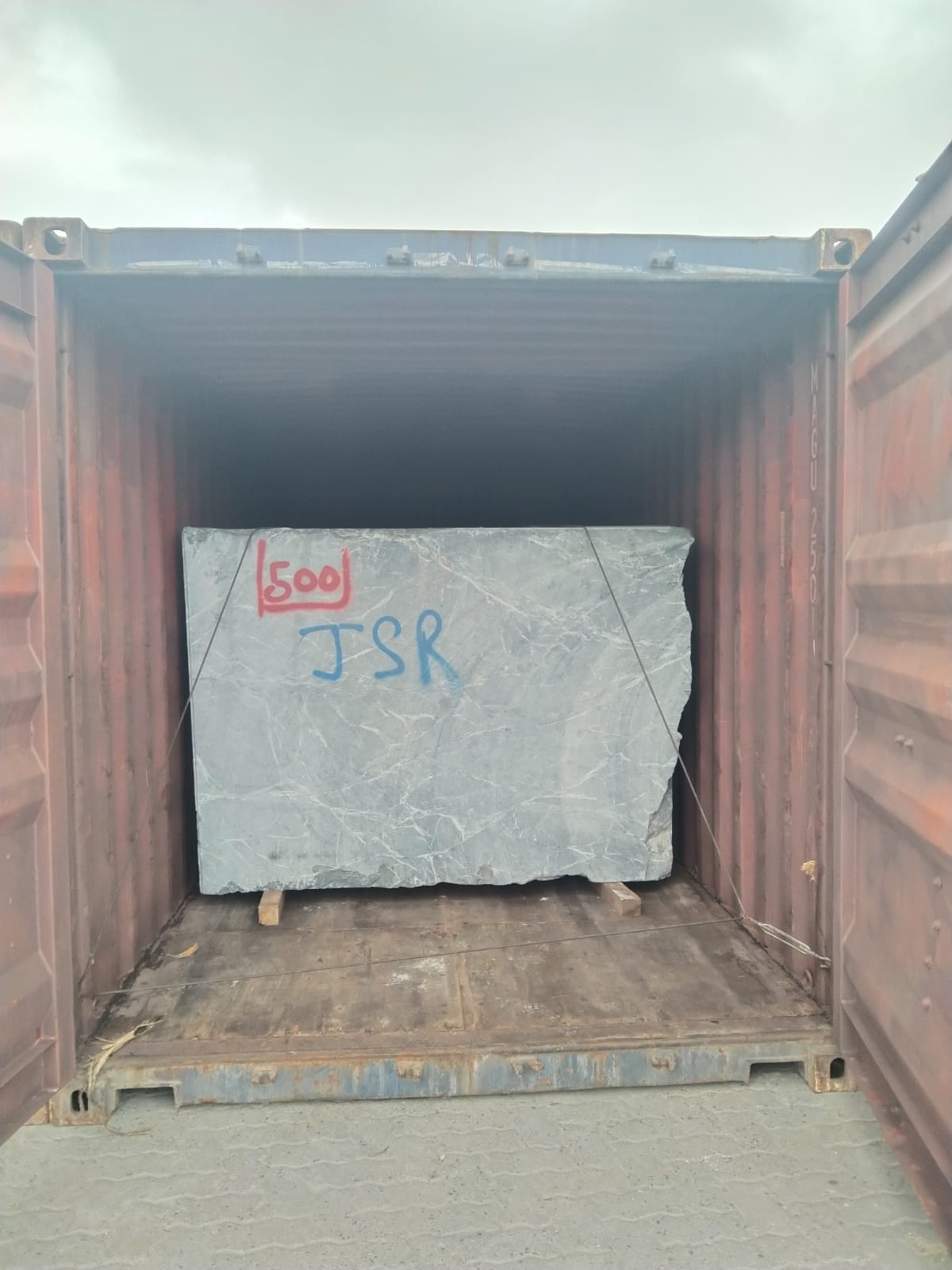 Massive Granite and Marble Block Chocked in Container